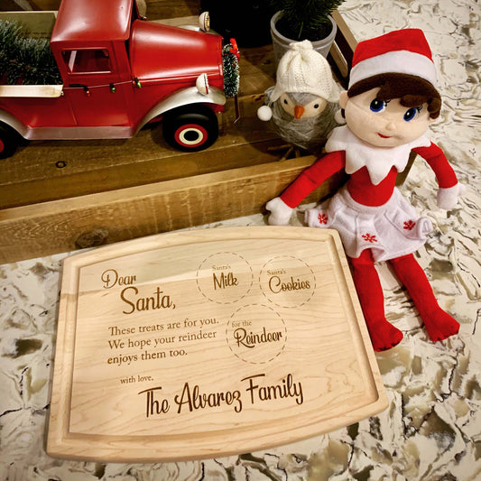 Santa cookie board displayed with Elf on the Shelf and holiday décor